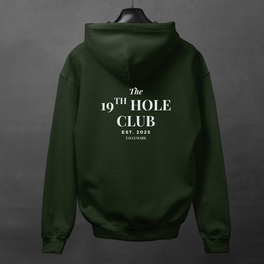 Green hoodie with "The 19th Hole Club" text on the back against a dark background