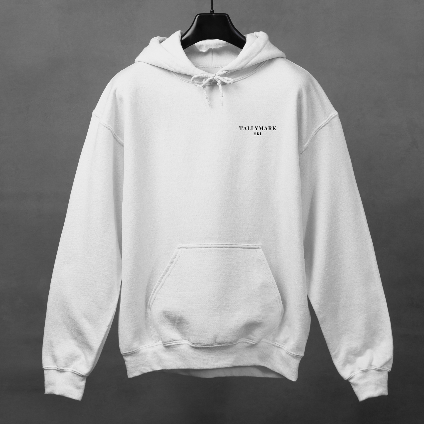 White hoodie with 'TALLYMARK SKI' logo on a gray background