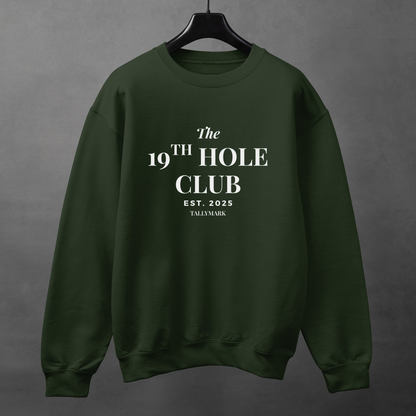 Green sweatshirt with "The 19th Hole Club" text against a dark background
