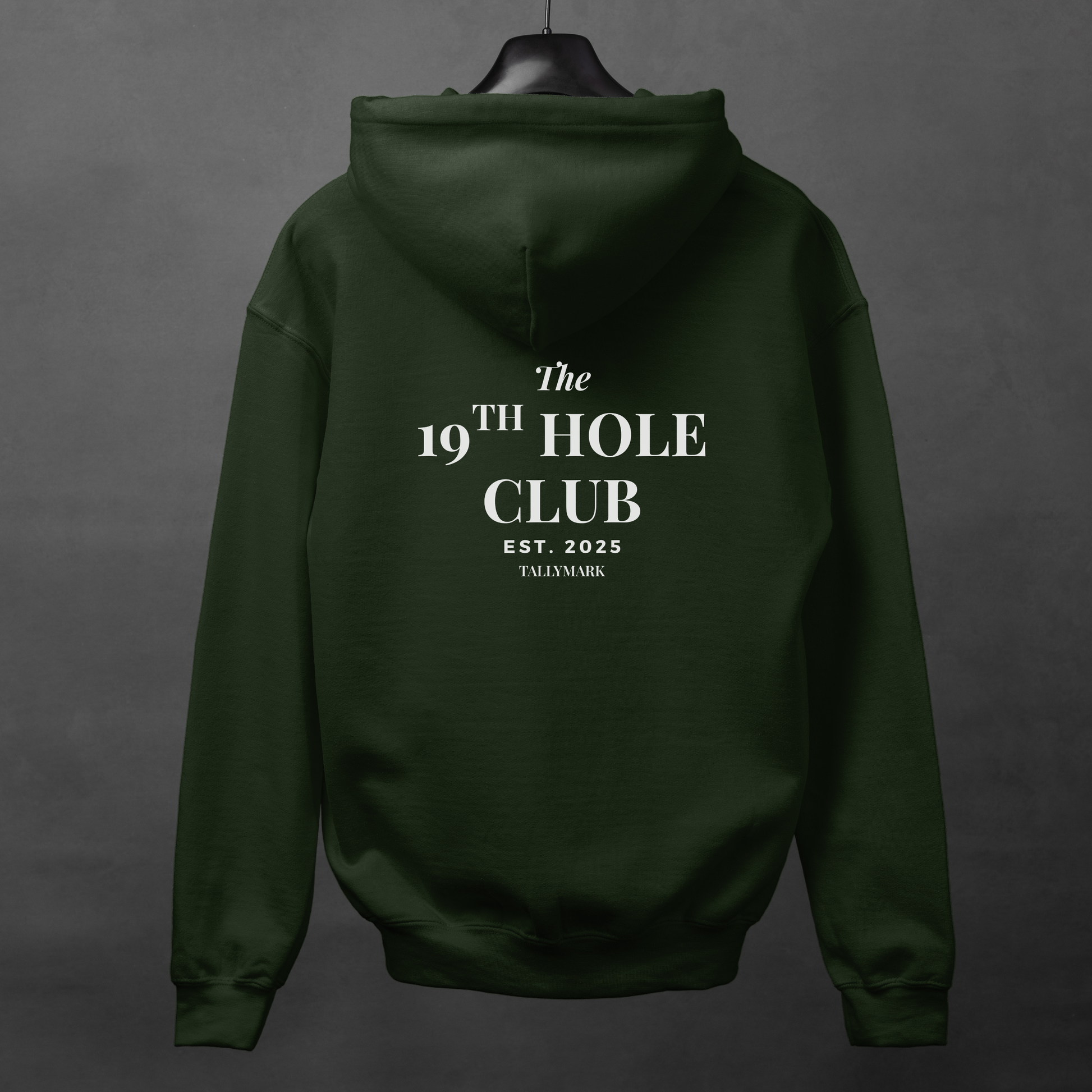 Green hoodie with "The 19th Hole Club" text on the back against a dark background