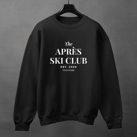 Black sweatshirt with 'The Après Ski Club' text on a gray background