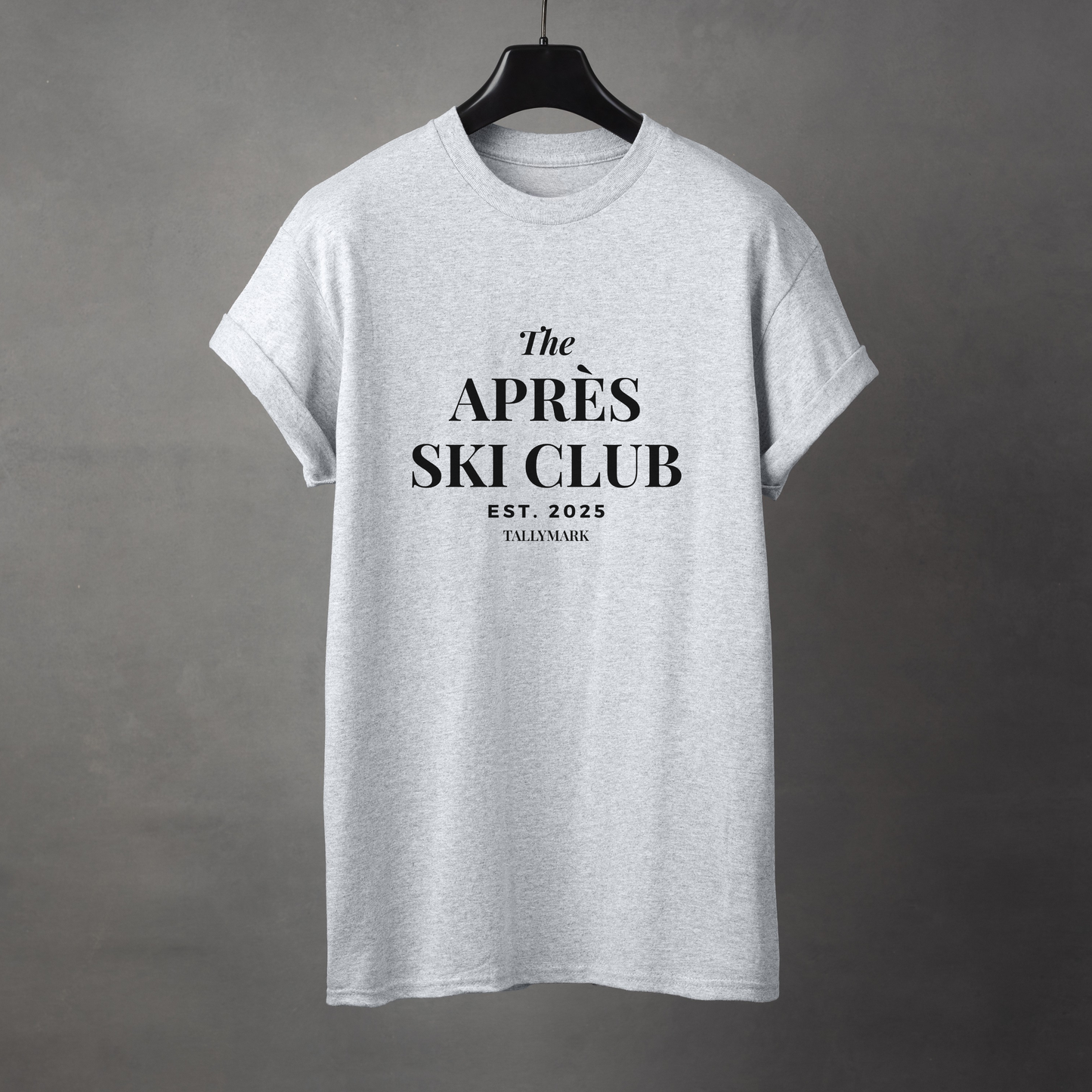 Gray t-shirt with 'The Après Ski Club' text on a gray background