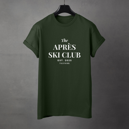 Green t-shirt with 'The Apres Ski Club' text on a gray background