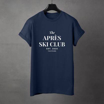 Navy blue t-shirt with 'The Après Ski Club' text on a gray background