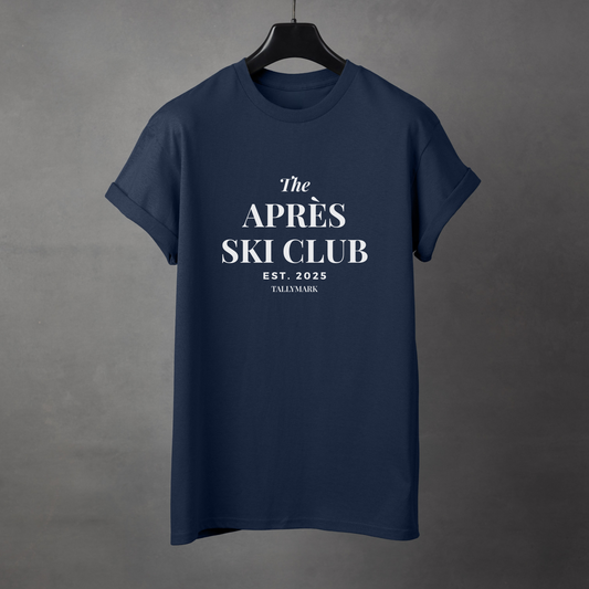 Navy blue t-shirt with 'The Après Ski Club' text on a gray background