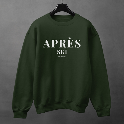 Green sweatshirt with 'Après Ski' text against a dark background