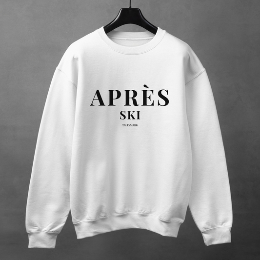 White sweatshirt with 'Après Ski' text against a dark background