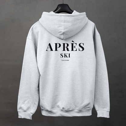 Gray hoodie with 'Après Ski' text on the back against a dark background