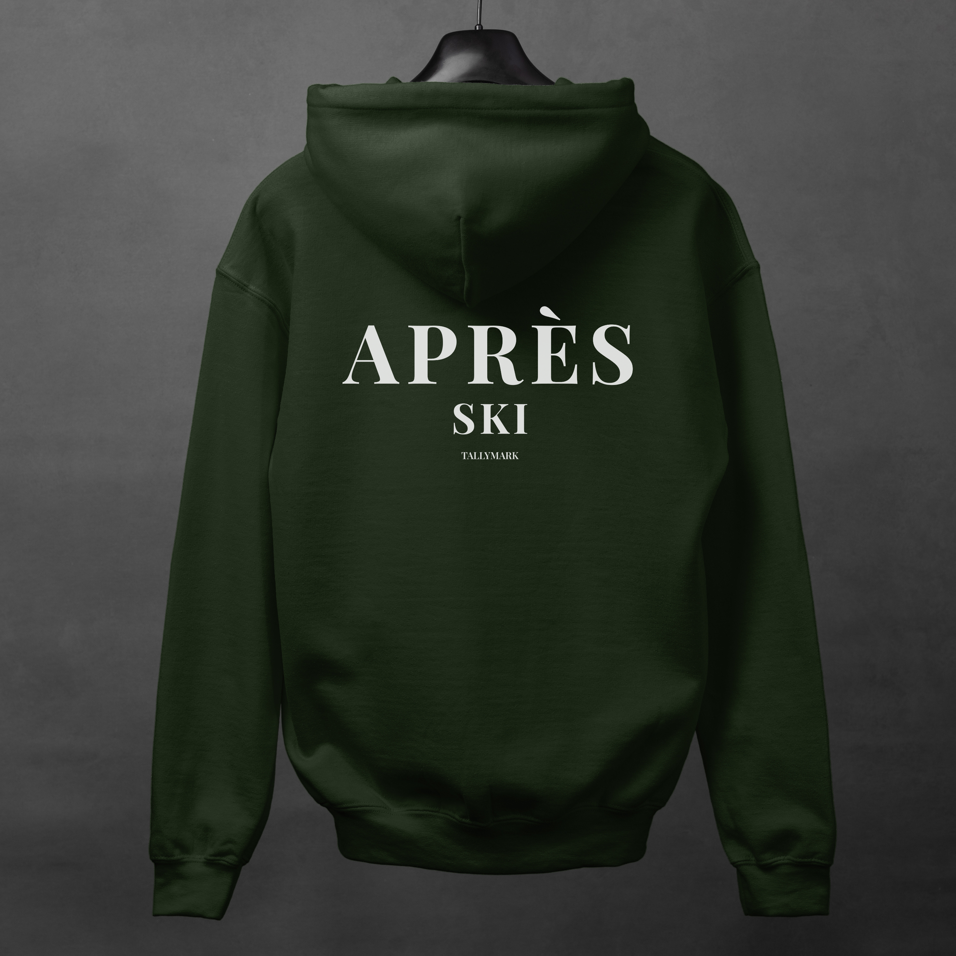 Green hoodie with 'Après Ski' text on the back against a dark background