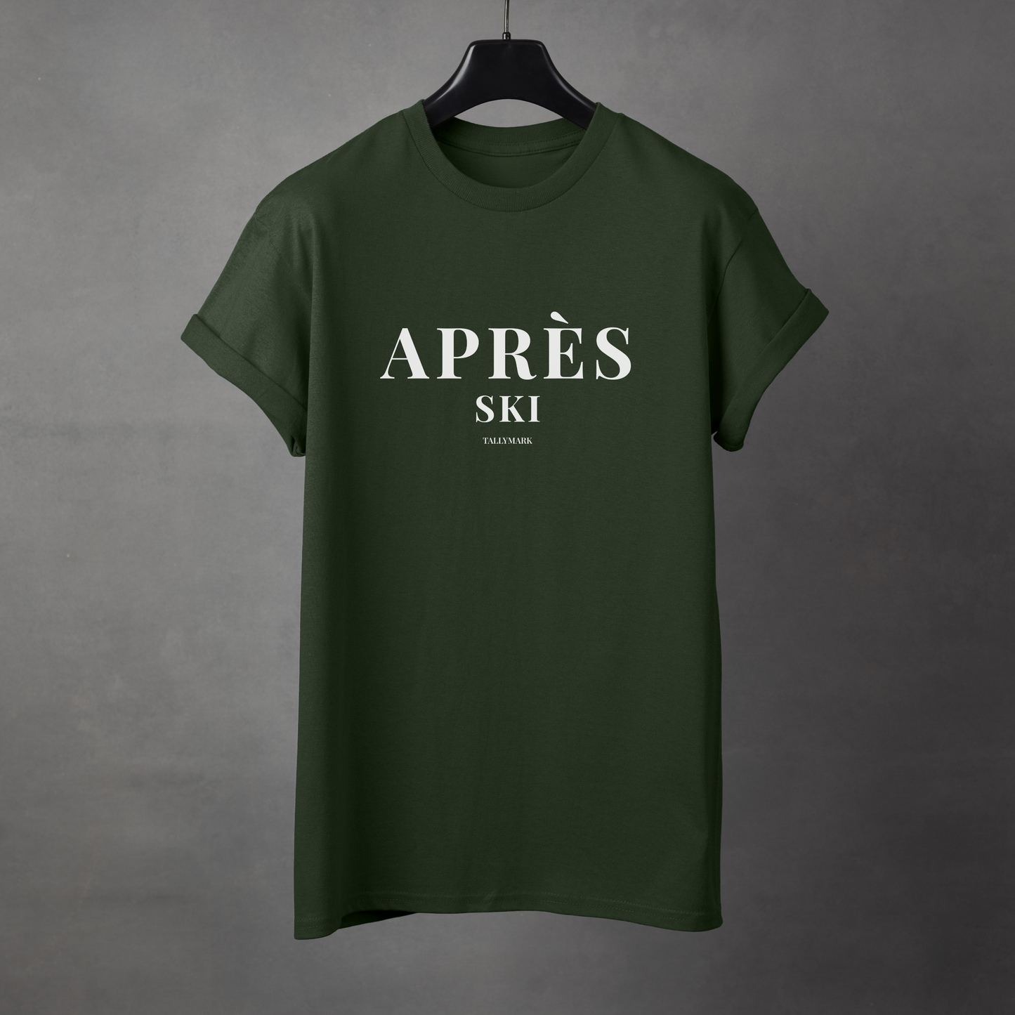 Green t-shirt with 'Après Ski' text against a dark background
