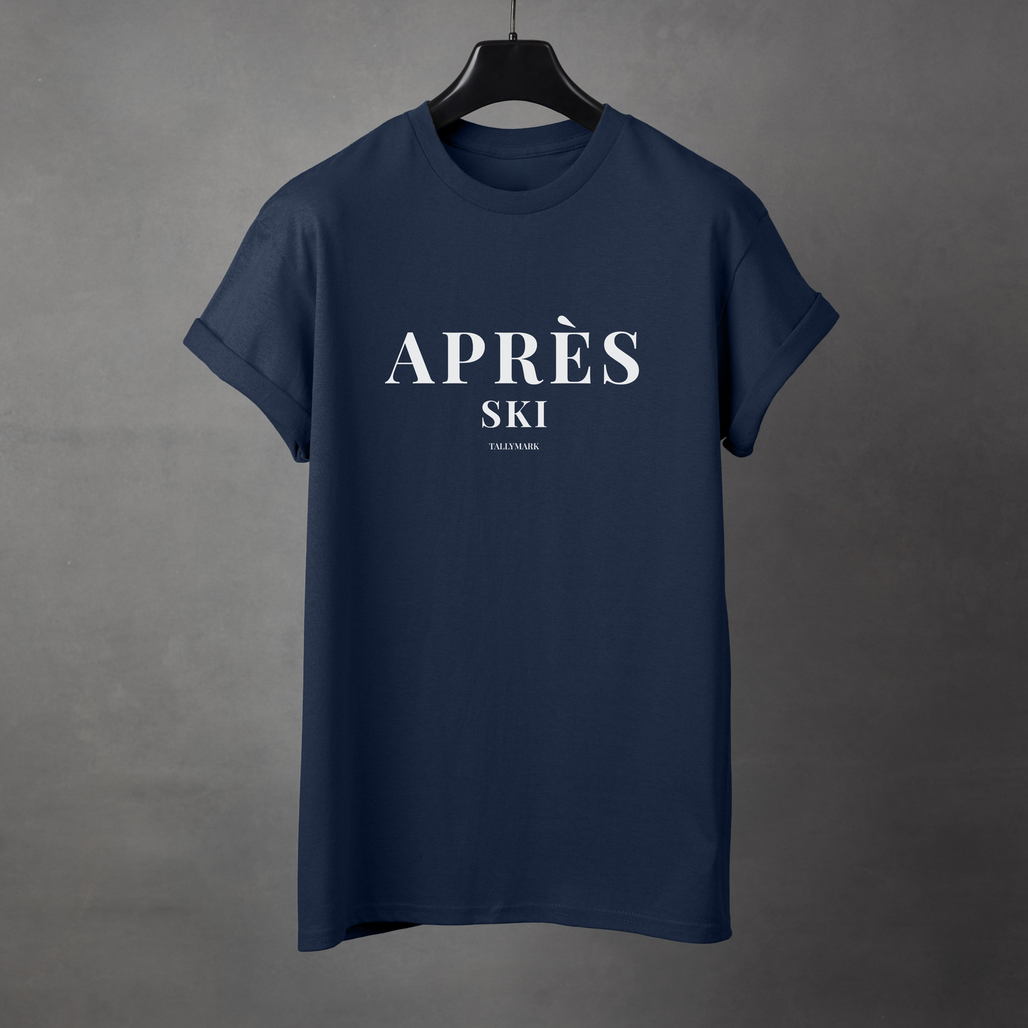 Navy blue t-shirt with 'Après Ski' text against a dark background