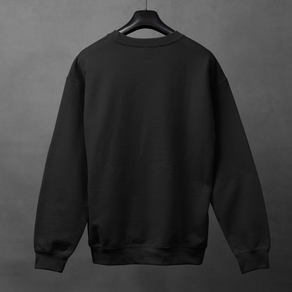Black sweatshirt on a hanger against a gray background