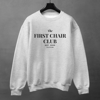 Gray sweatshirt with 'The First Chair Club' text on a gray background
