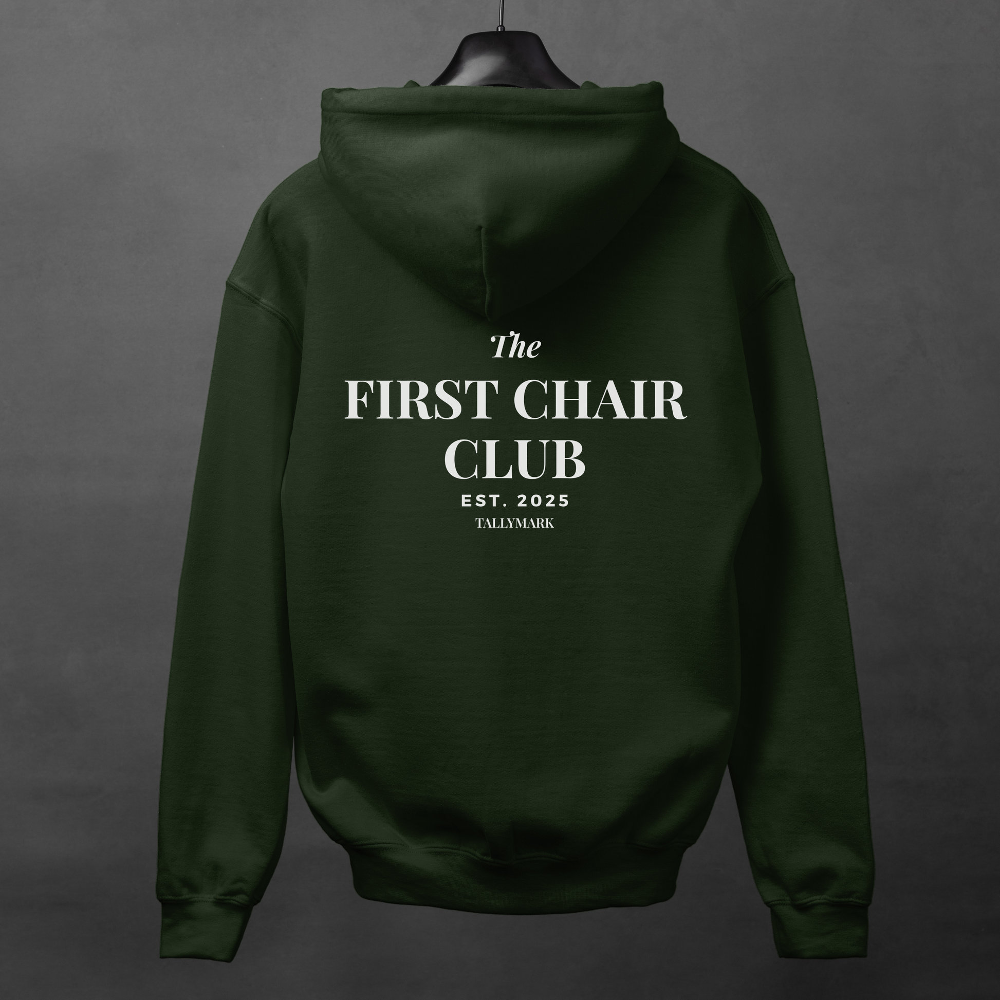 Green hoodie with 'The First Chair Club' text on the back against a gray background