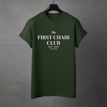 Green t-shirt with 'The First Chair Club' text on a gray background