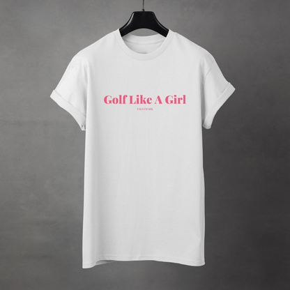 White t-shirt with pink 'Golf Like A Girl' text against a dark background