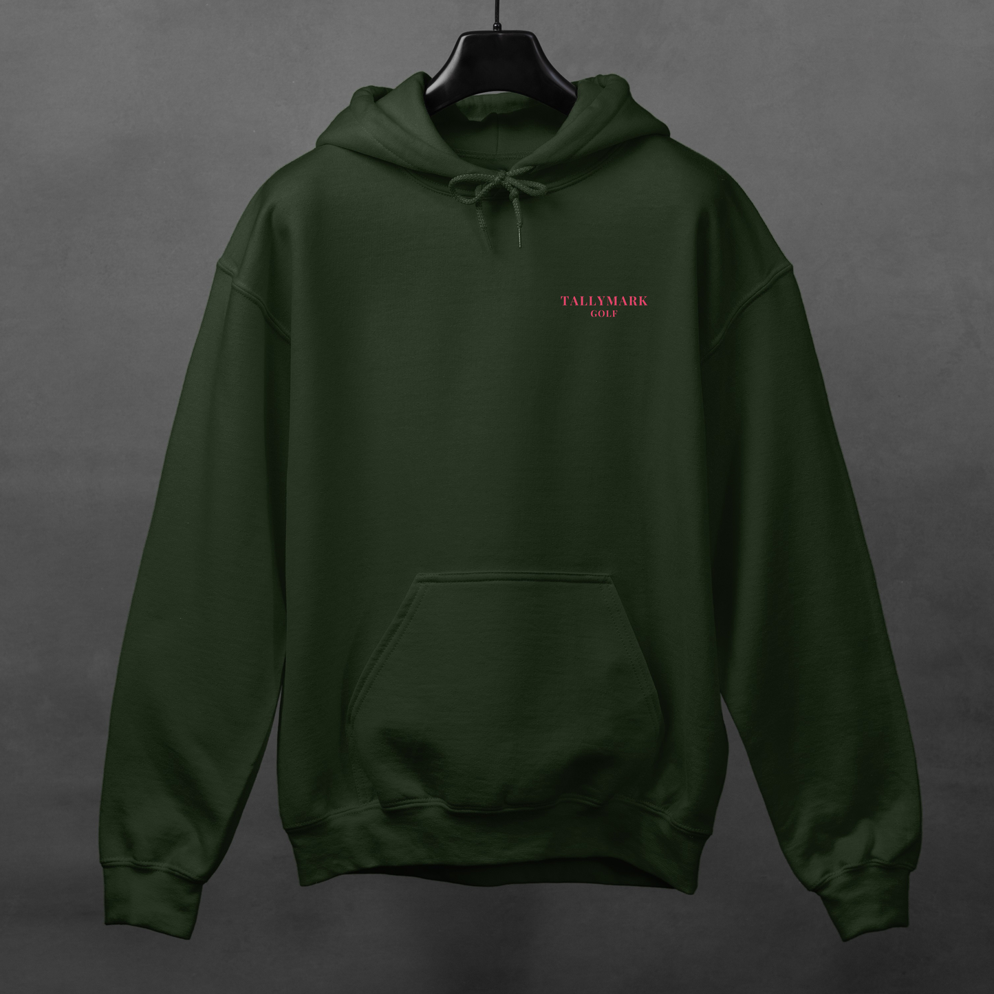Green hoodie with pink 'TALLYMARK GOLF' logo on a gray background