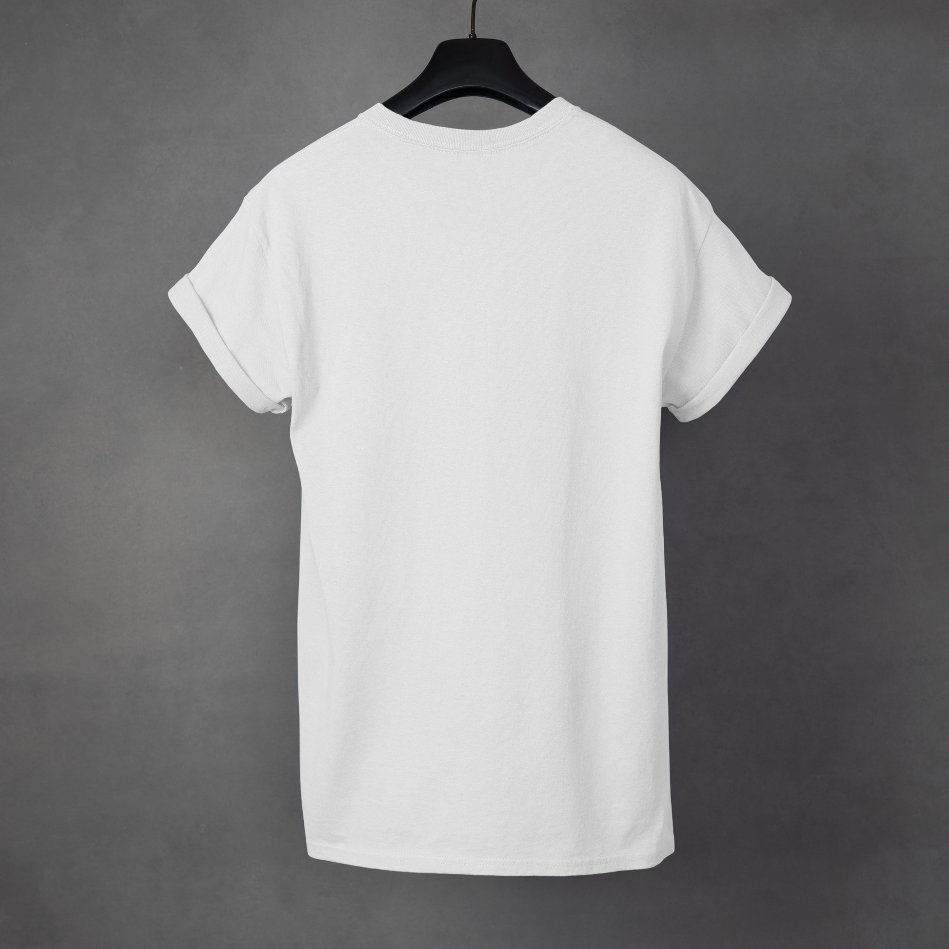 White t-shirt on a hanger against a gray background