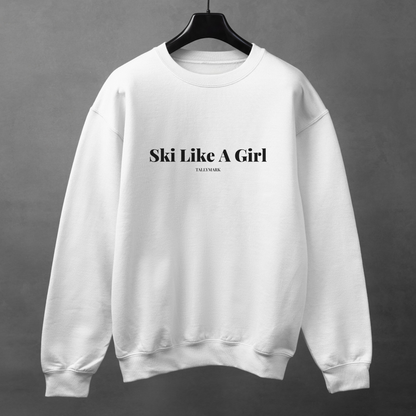 White sweatshirt with 'Ski Like A Girl' text on a gray background