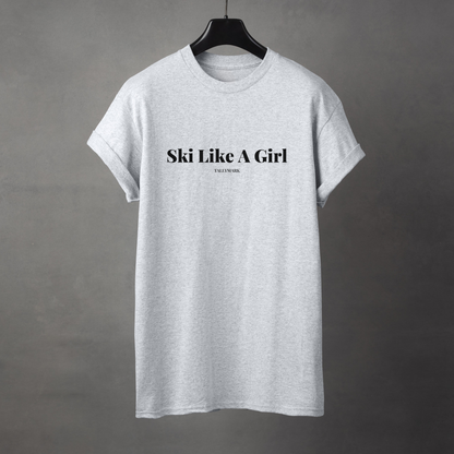 Gray t-shirt with 'Ski Like A Girl' text on a gray background