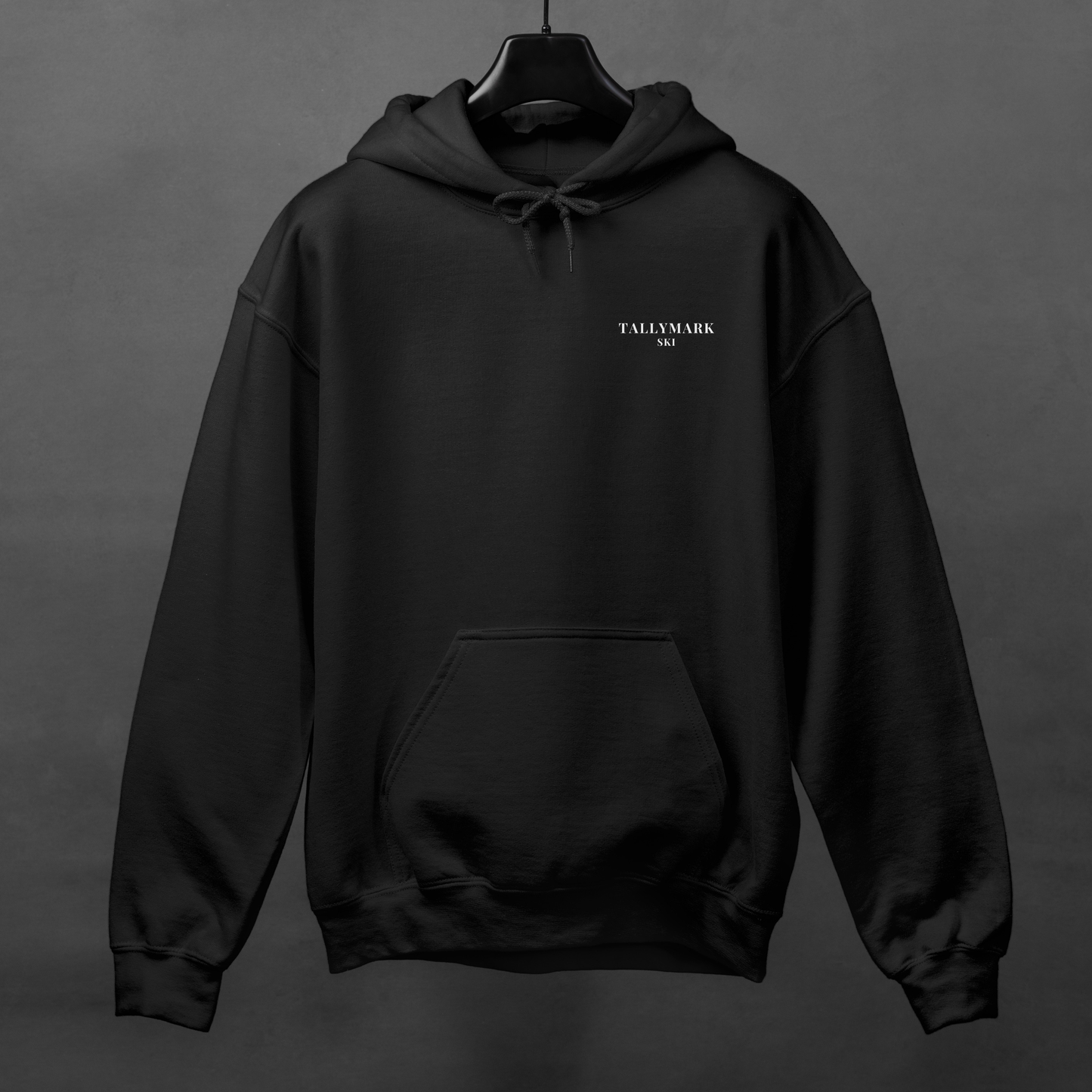 Black hoodie with 'TALLYMARK SKI' logo on a gray background