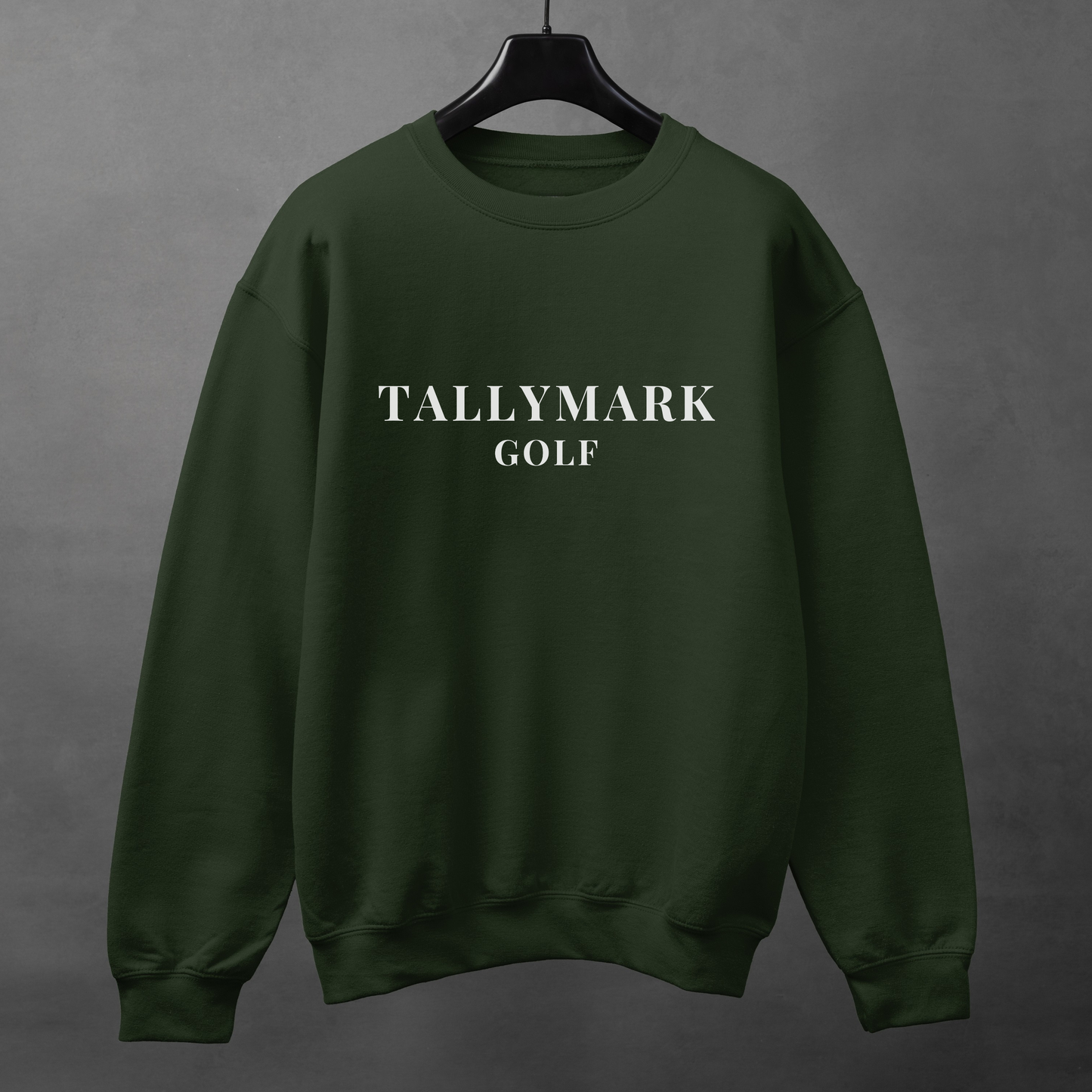 Green sweatshirt with 'TALLYMARK GOLF' text against a dark background